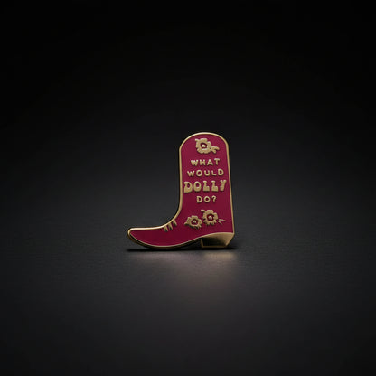 A burgundy cowboy boot with a floral design and the words "What would Dolly Do?"