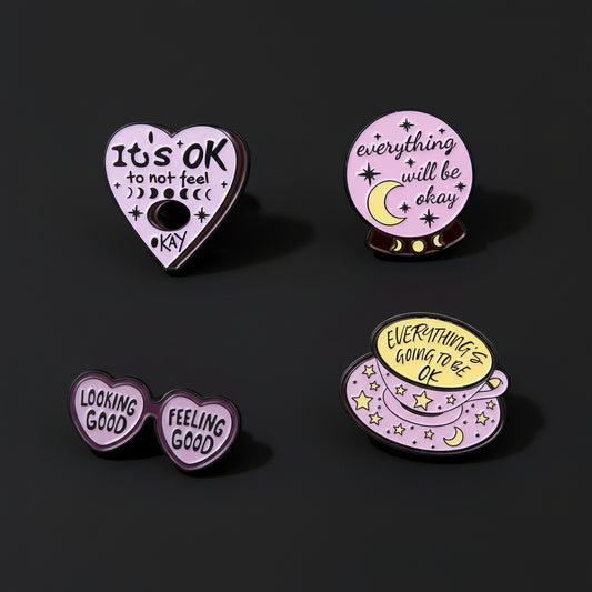 witchy affirmation enamel pins grouped together