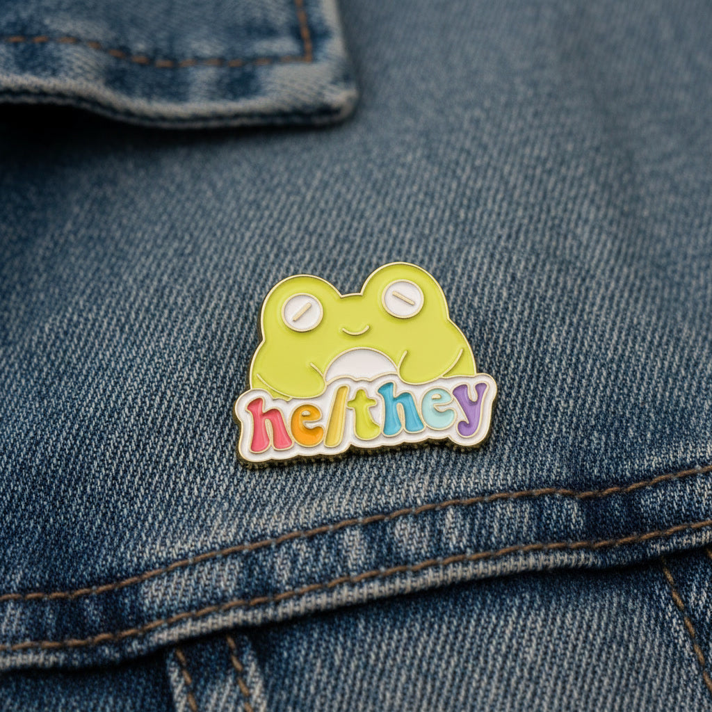 He/They Frog Enamel Pin – Pronoun Pin, Cute Frog Pin, LGBTQ+ Accessory
